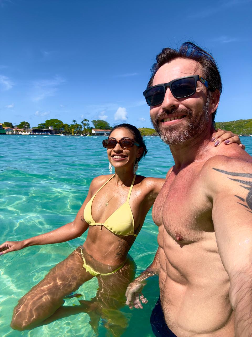 Hosts sharing a meal with guests